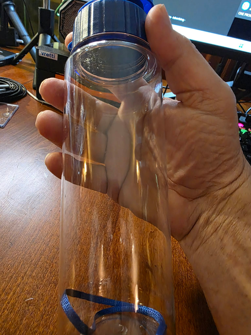 Clear Portable Water Bottle with Blue Lid