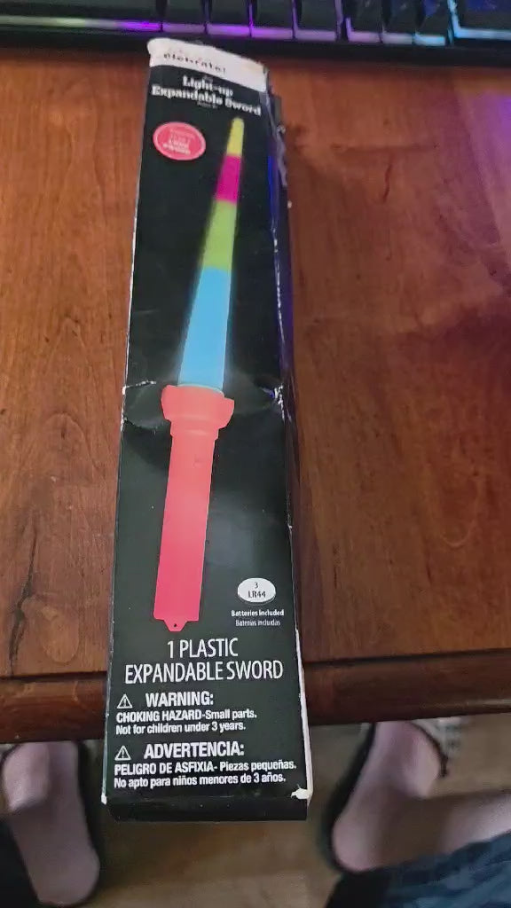 Celebrate! Light-Up Expandable Sword (1 Piece)